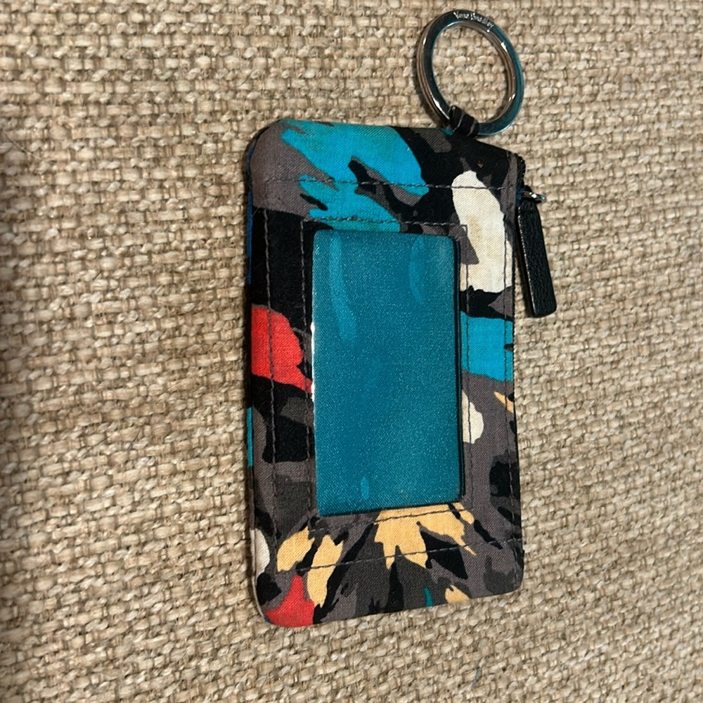 Vera Bradley key chain wallet. Zip top and clear window for ID